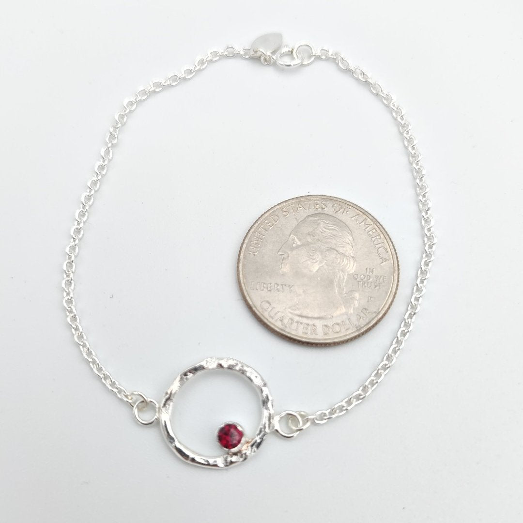 Sterling silver hammered halo and garnet bracelet w/US quarter