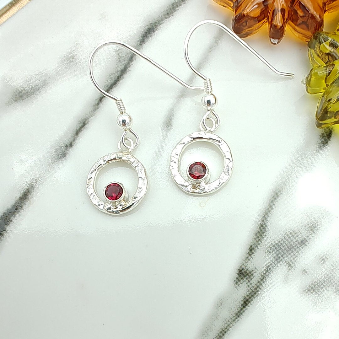 Sterling silver handcrafted hammered halo garnet earrings