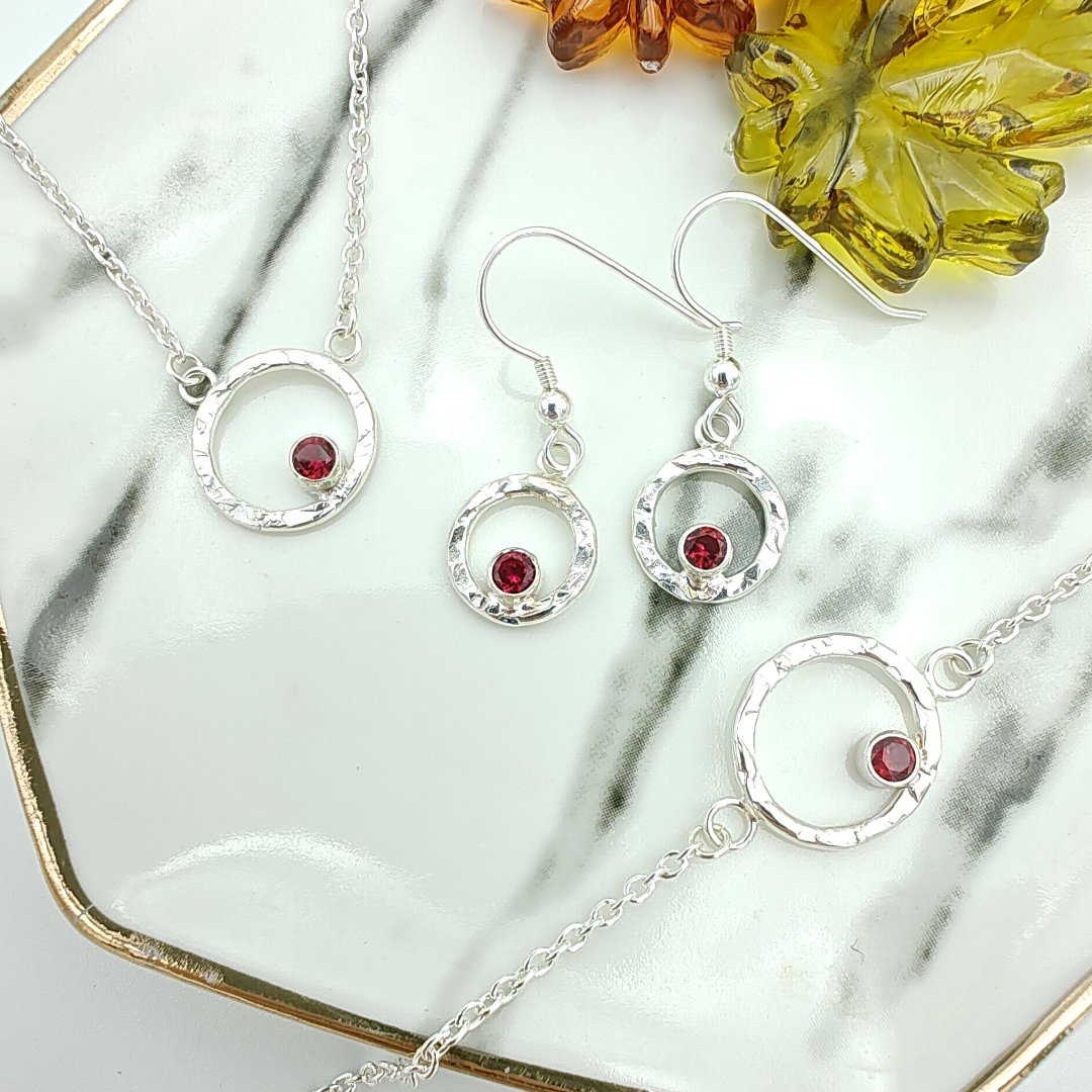 Sterling silver hammered halo and garnet complete set with necklace, earrings and bracelet