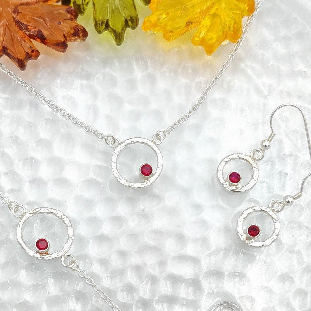 Sterling silver hammered halo and garnet complete set with necklace, earrings and bracelet