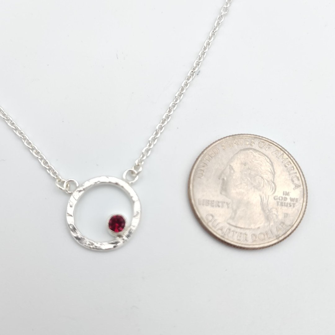 Garnet birthstone in hammered sterling silver circle pendant necklace with US quarter